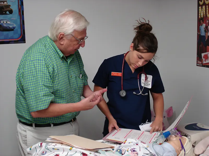 A doctor and nurse talking