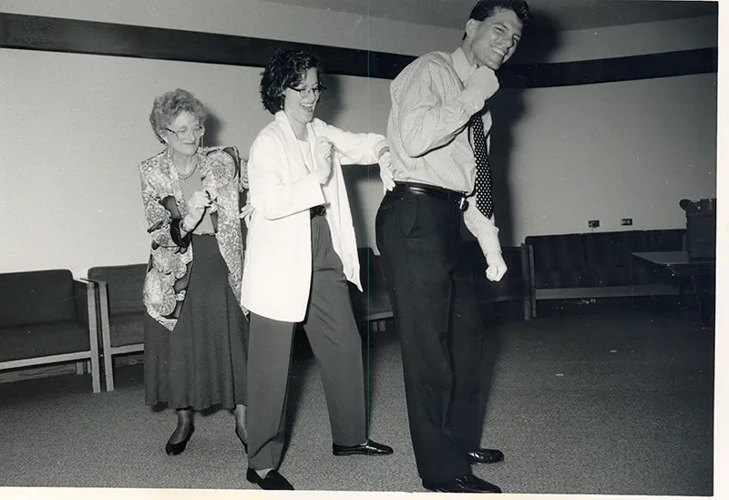 Three people dancing