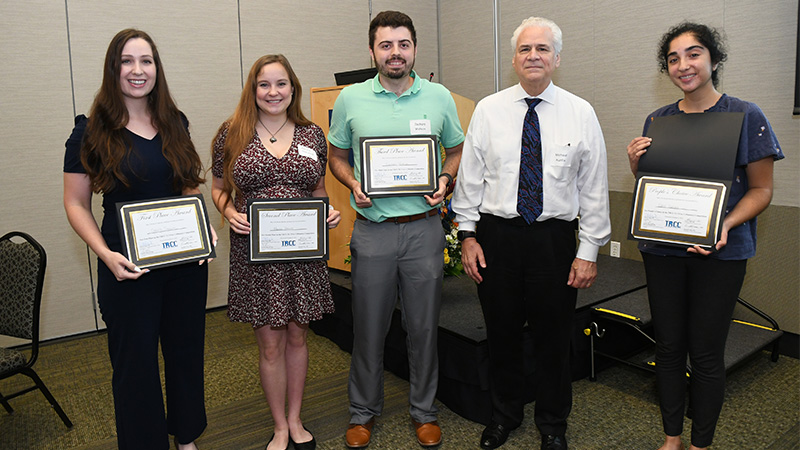 T1-T4 in 3 (minutes) Competition winners. Pictured, from left, are Danielle Jamison (1st Place), Melissa Henwood (2nd Place), Zachary Watson (3rd Place), and Pahul Hanjra (People’s Choice) - IMG5