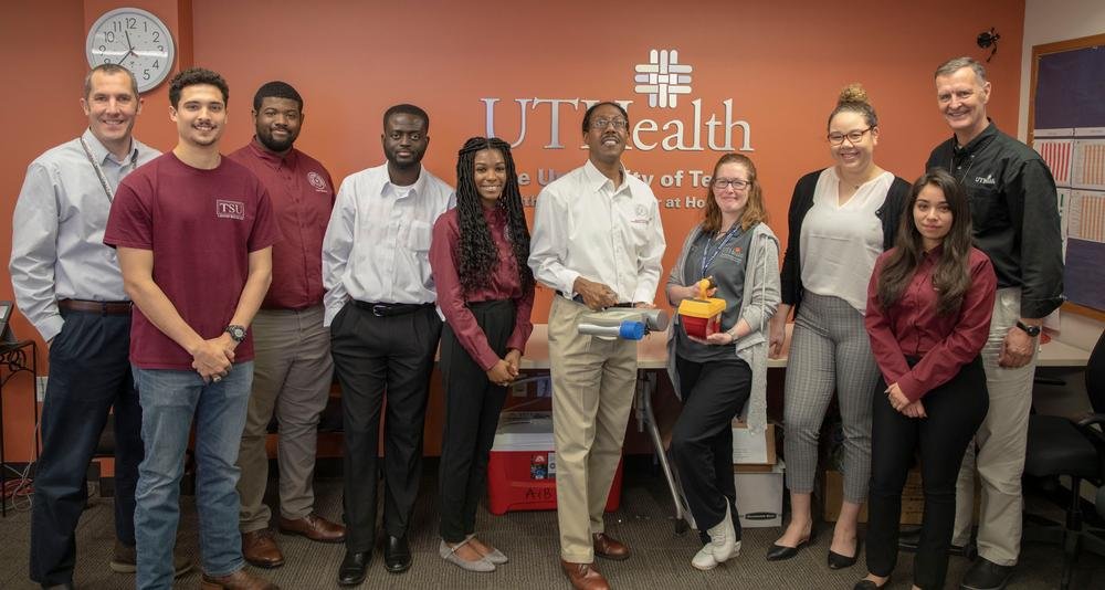 Dr. Mark Harvey, center, leads his group of Texas Southern University students on a study of the decommissioned cyclotron facility, with the help of UTHealth. (Photo by McGovern Medical School)