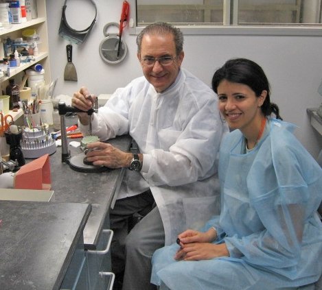 In this 2009 photo taken in the Dental Branch Building, Dr. Rodney Beetar works with then-dental student Nisa Dadjoo, DDS ’10, MSD ’13.
