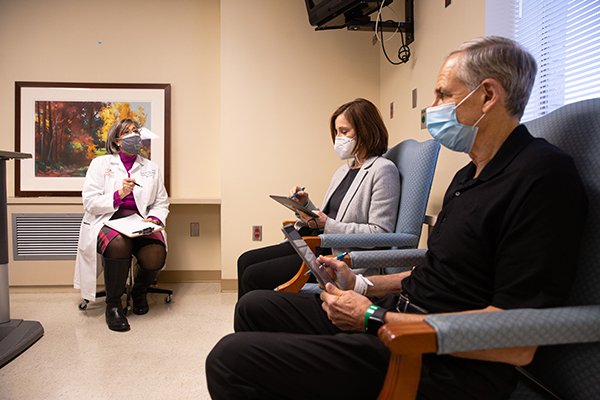 Carmel B. Dyer, MD, speaks to two trial participants at the UTHealth Clinical Research Unit at Memorial Hermann-Texas Medical Center. (Photo by: Roger Castro/UTHealth)