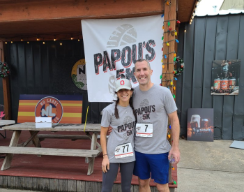 Krista and Scott Patlovich at the Papou 5K event, which honored Krista's late father, Nick Georgas, and raised money to support COVID-19 research at UTHealth Houston. (Photo by Meredith Raine/UTHealth Houston)