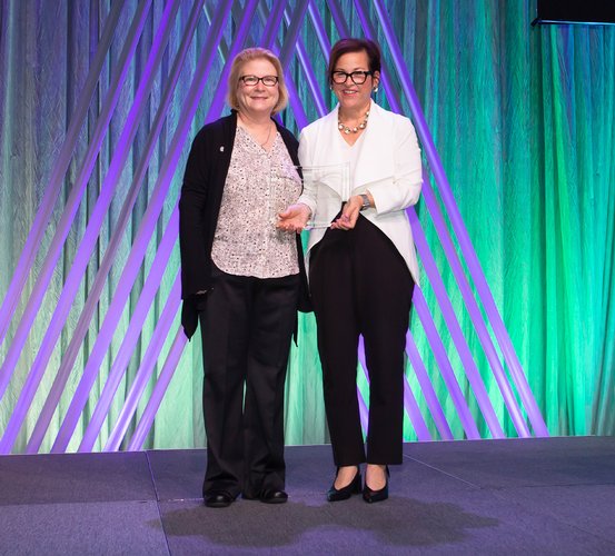 Dr. Mary (Cindy) Farach-Carson (left) accepts the Stephen M. Krane Award in October at the ASBMR 2021 Annual Meeting in San Diego.