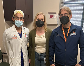 After experiencing extreme fatigue, Elizabeth Dravis was diagnosed with minimal change disease, a rare kidney disease. She visits with her doctors Aliasger Aun Ali, MD (left) and Donald A. Molony, MD (right).  (Photo Courtesy of Elizabeth Dravis)