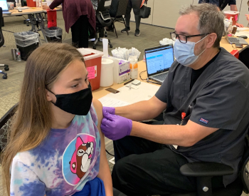 On Thursday, 14-year-old Allison received her first dose of the Pfizer COVID-19 vaccine at UT Physicians. (Photo credit: Melissa McDonald, UT Physicians).