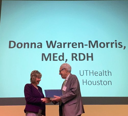Retired UT System executive Kenneth Shine, MD, welcomes Donna Warren Morris, RDH, MEd, to membership in the academy of health science education named in his honor.