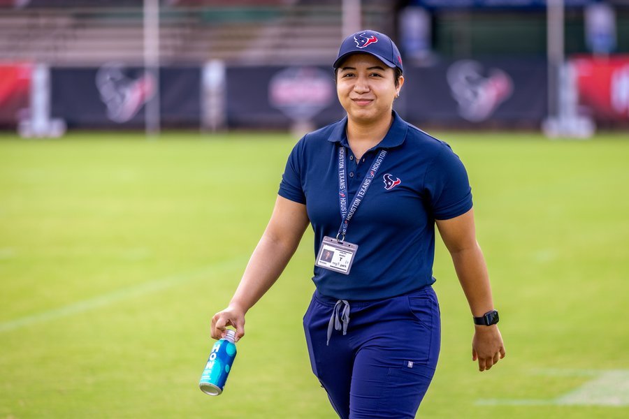 Analisa Narro, a fourth-year student with McGovern Medical School at UTHealth Houston, during her rotation with the Houston Texans. (Photo by Nathan Jeter/UTHealth Houston)