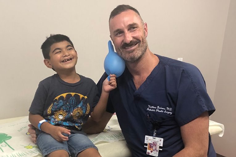 Jae Beltran, now 7, sees pediatric plastic surgeon Matthew Greives, MD, for annual checkups to monitor his cleft lip and palate. (Photo courtesy of Sonia Estrada)