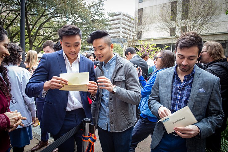 Students from the 2019 Match Day ceremony open their envelopes to see where they will spend their residency. Photo by UTHealth Houston