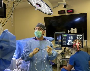 Steven Canfield, MD, performs a focal therapy procedure that uses electrodes to destroy targeted tissue with electricial pulses during prostate cancer surgery. (Photo by UTHealth)