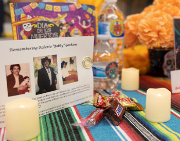 Photo of a table decorated as an ofrenda for Dia De Los Muertos. (Photo by UTHealth Houston)