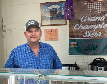 Mark Wise stands proudly in his family-owned business, Wise Meat Market. (Photo provided by Wise family)