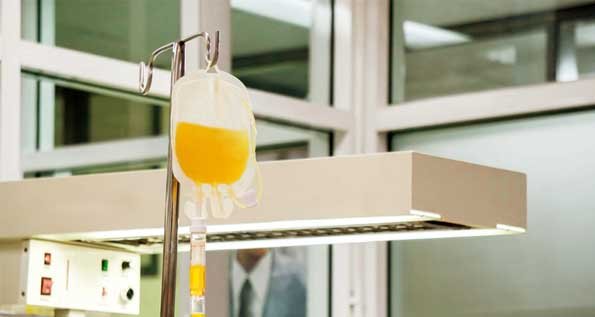 Photo of a plasma donation hanging in a hospital room.