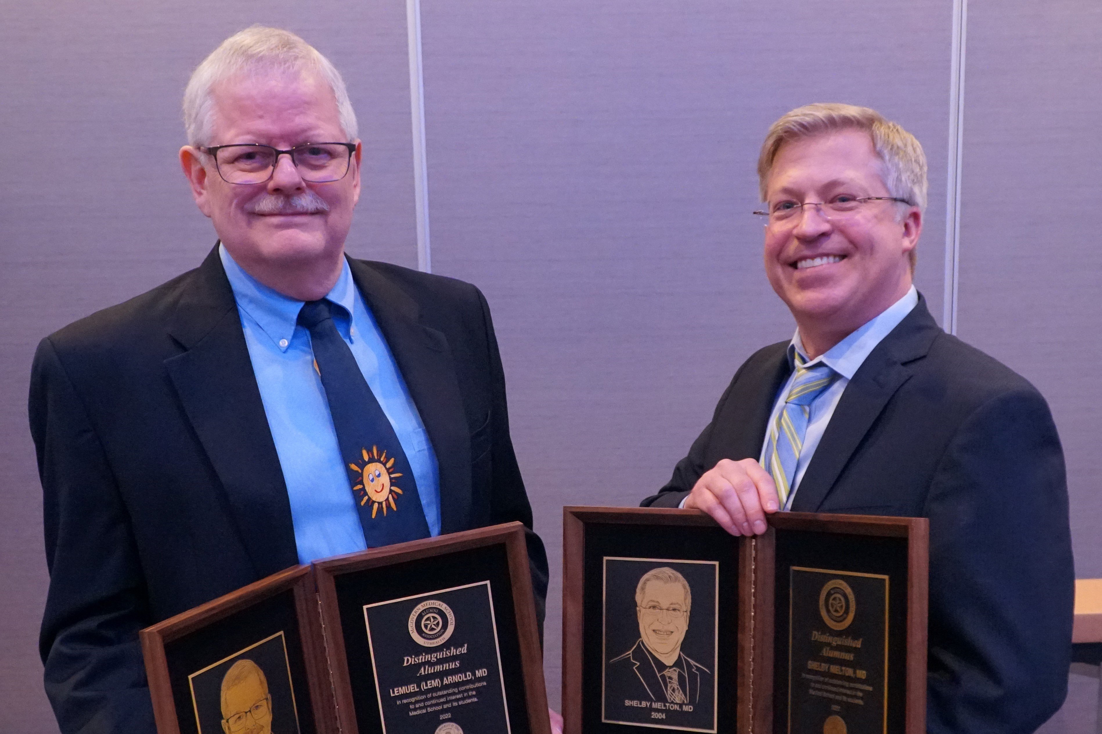 Melton, Arnold honored with the distinguished Alumnus Award