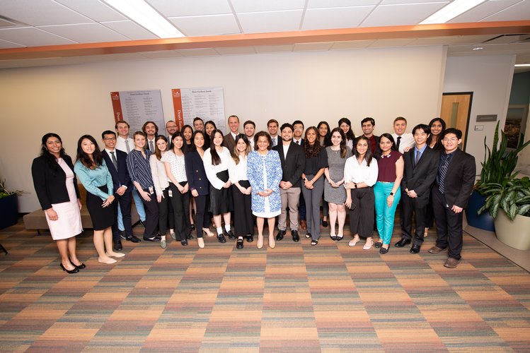Prior to the 12th Annual Student Research Showcase, presenters gathered for a photo with alumna Dr. Rena D’Souza, director of the National Institute of Dental and Craniofacial Research, who served as the event’s keynote speaker.