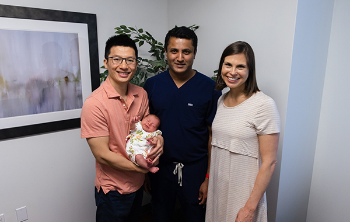 Photo of Dr. Ramesh Papanna, MD, with the Briggs-Cheng family. (Photo by UTHealth Houston)