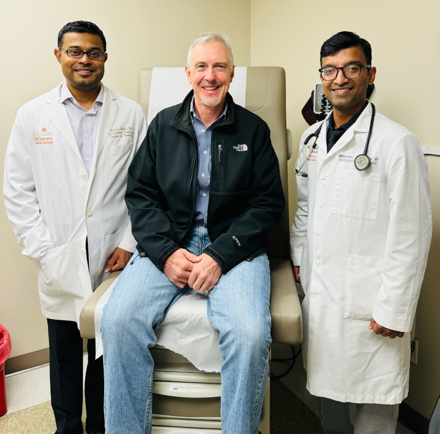 Interventional cardiologists Abhijeet Dhoble, MD, (left), and Muhammad Khan, MD, (right), were part of a UTHealth Houston team of experts who treated patient Brenton Parr after he suffered a major stroke. (Photo by UTHealth Houston)