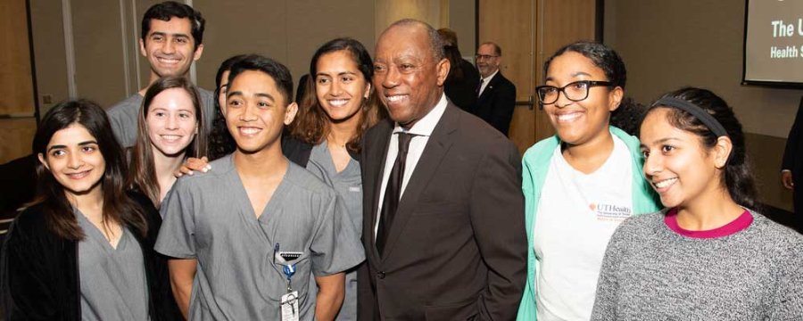 Image of Houston mayor kicks with students at the Diversity and Inclusion Week at UTHealth School of Dentistry