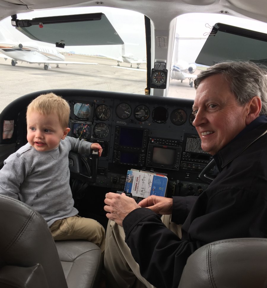 Marty Young Jr., right, with his grandson AJ in the cockpit of Young's plane before his Parkinson's disease diagnosis. (Photo courtesy of Marty Young Jr.)