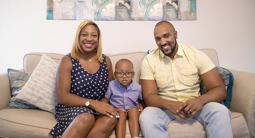 Jasmine and Andre Hicks with their son, Wesley.