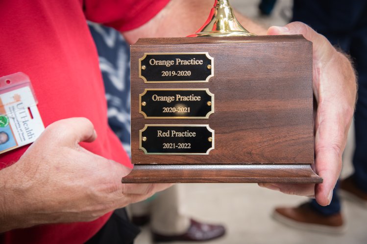 The three recipients of the UTHealth Houston School of Dentistry Digital Dentistry Practice of the Year are listed on the side of the trophy.
