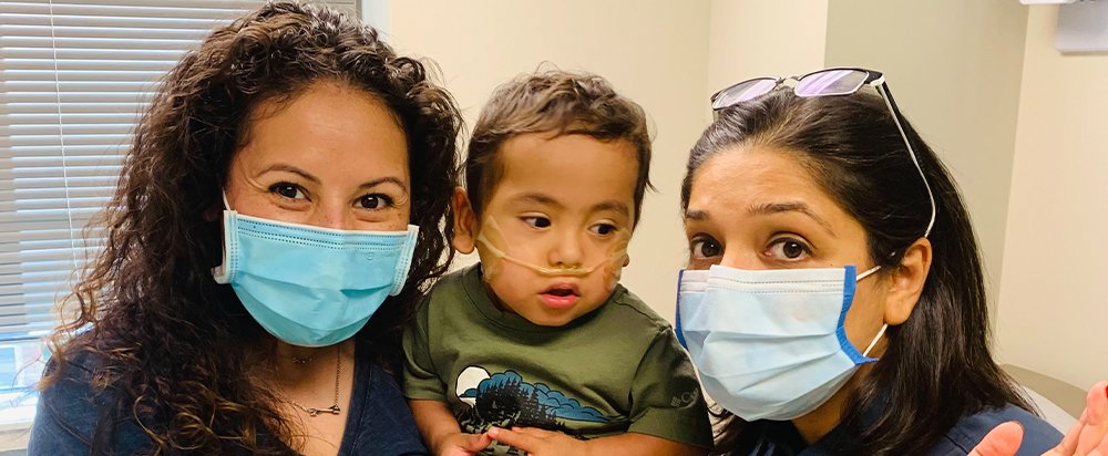 A photo of Lisa Ordaz, her son Noah Ordaz, and and Fatima Boricha, MD, assistant professor of pediatrics with McGovern Medical School. (Photo courtney of Fatima Boricha, MD)