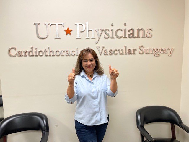 Brenda Trevino gives two thumbs up in the UT Physicians Cardiothoratic and Vascular Surgery clinic