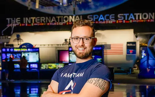 Colin Hills, BSN, RN, a 2020 graduate, worked in a hospital emergency department before working as a health maintenance systems operations and developing processes and procedures for the International Space Station. (Photo by UTHealth Houston)