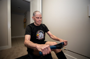After injuries sidelined him from running marathons, Reuben Bronstein discovered rowing as a new passion. Double shoulder replacements keep the 79-year-old pain-free these days as he rows more than 50 miles a week. (Photo by Logan Ball, UT Physicians)