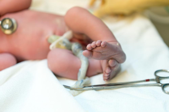 Photo of a baby's feet and umbilical cord, as Fabio Triolo, DdR, PhD, shares about the benefits of donating umbilical cord blood. (Photo credit: Getty Images)