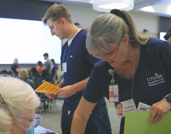 Students at UTHealth Houston participate in a poverty simulator exercise where they learn firsthand how financial hardships can affect access to health care. (Photo courtesy of UTHealth Houston School of Public Health)