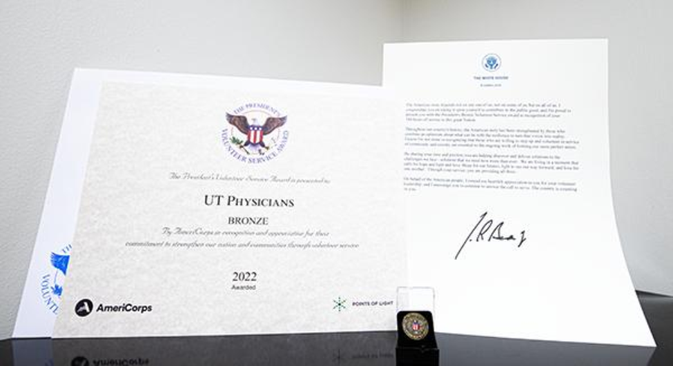 PVSA certificate and White House letter. (Photo provided by UT Physicians Marketing and Communications team)