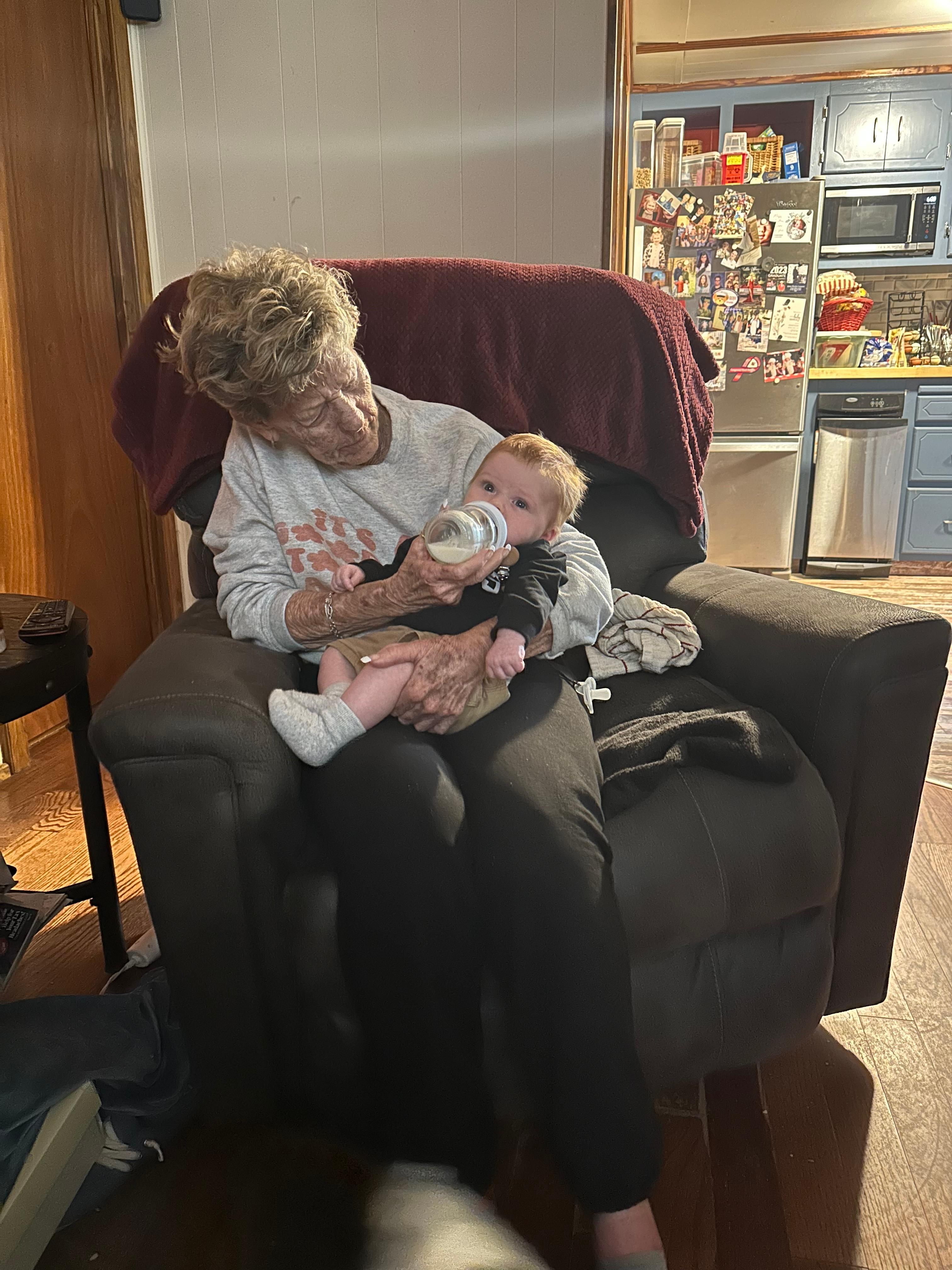 Faye Sims holding her newest grand baby Carter Maggard.