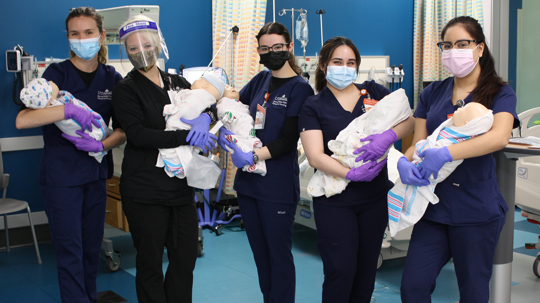 Instructor Candice Triulzi (second from left) taught BSN students how to resuscitate the littlest patients. Pictured with her (L-R) are students Claire Basso, Mackenzie Arrington, Gabriela Rosales-Valdes, and Ciara Santos.