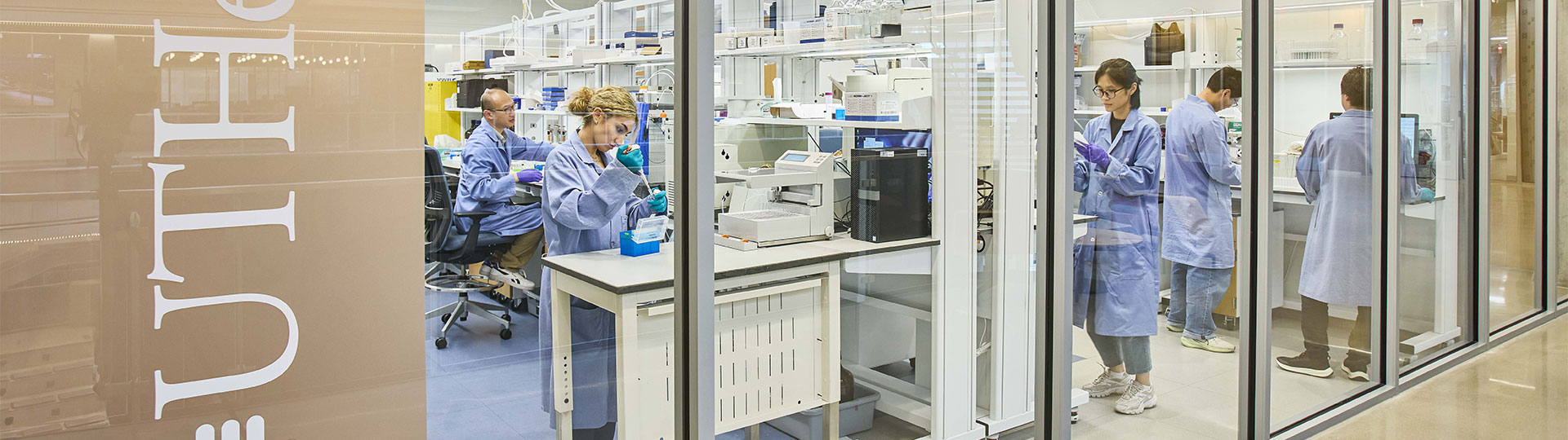 Exterior view of a lab full of researchers