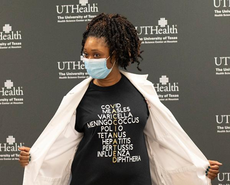 Jeffeea N. Gullet, MD, proudly displays her shirt promoting vaccines that have saved countless lives. (Photo by Cody Duty, UTHealth)
