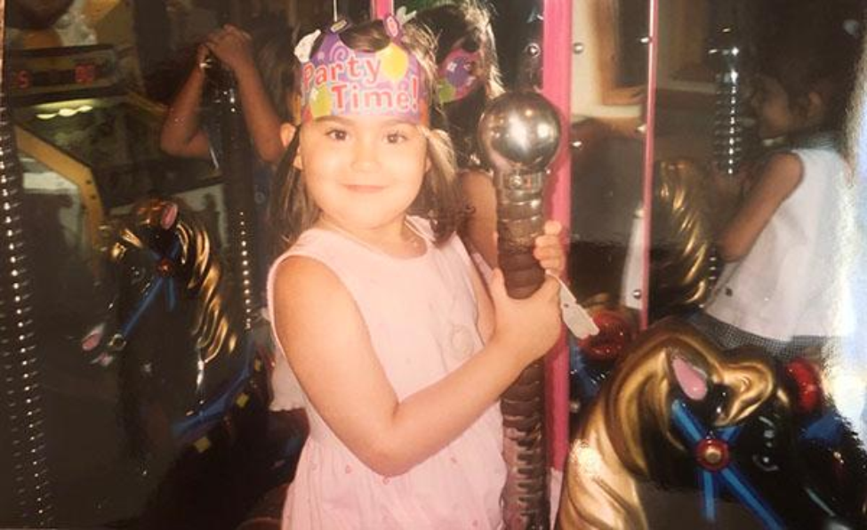 Picture of Caroline Love at her fifth birthday. At this time she could not speak or hear due to her LKS. (Photo courtesy of Caroline Love)