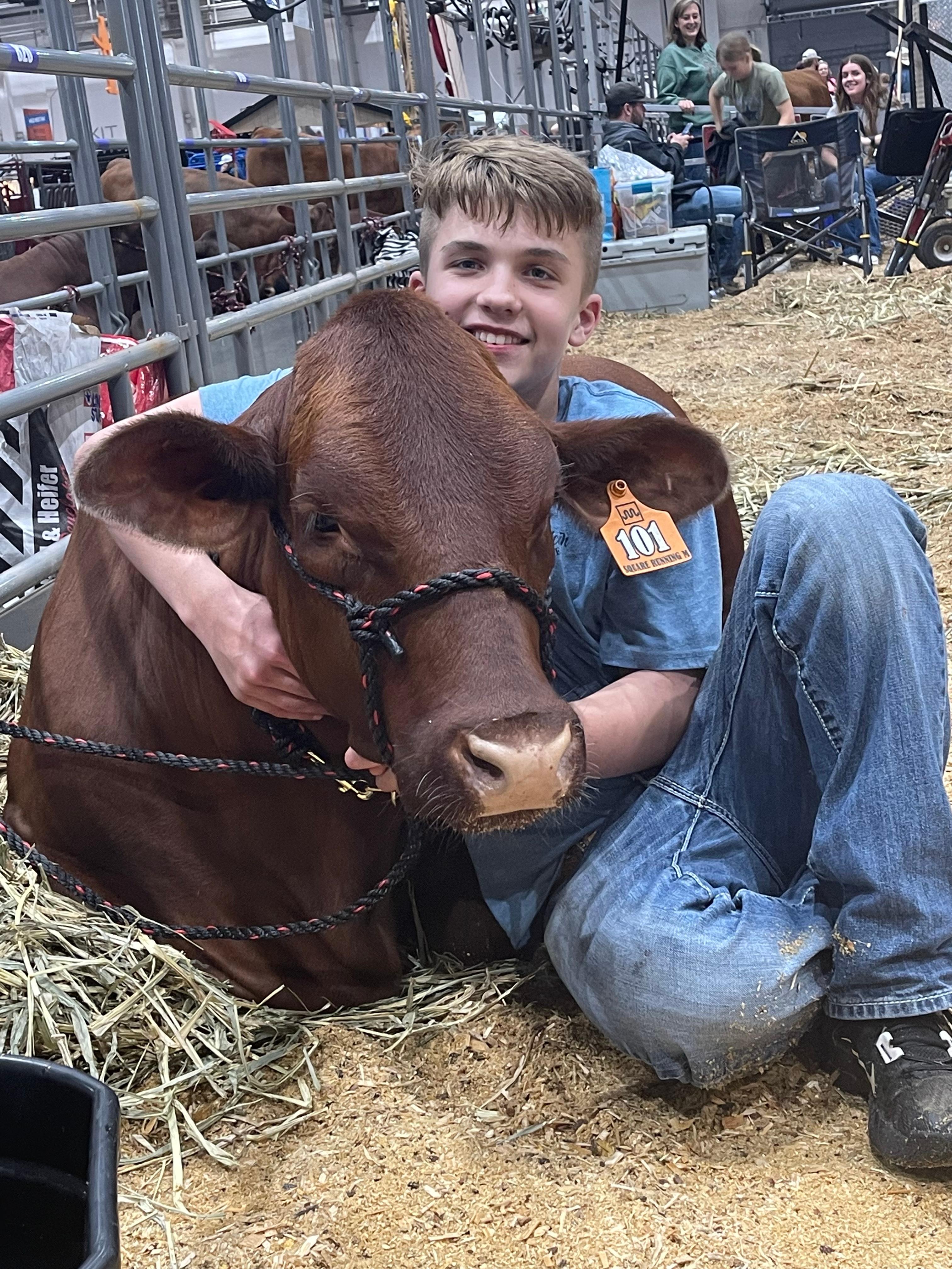 Geordon Boulware sits with his steer at the 2024 HLSR.