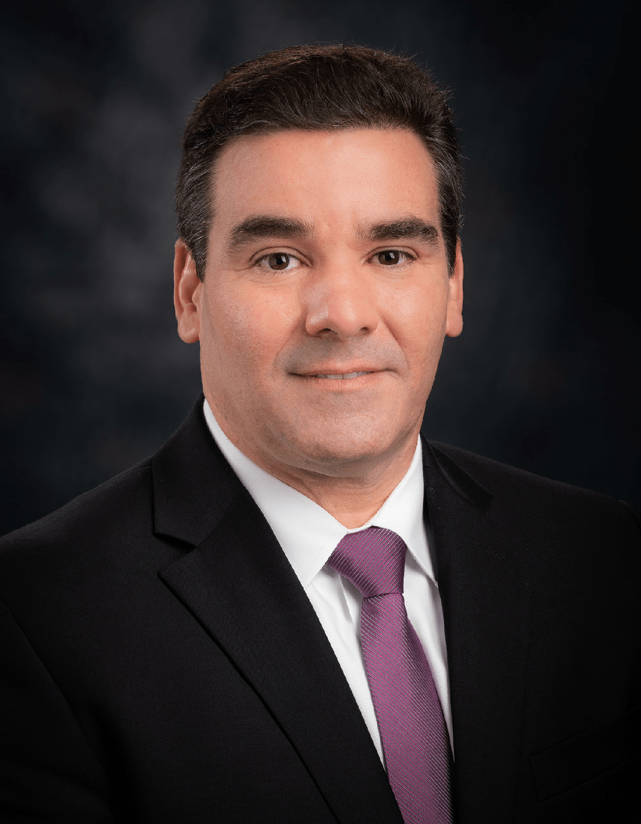 Headshot of Dean John Valenza, DDS