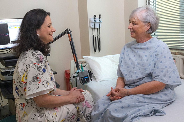 Elderly woman discussing health related issues with her doctor