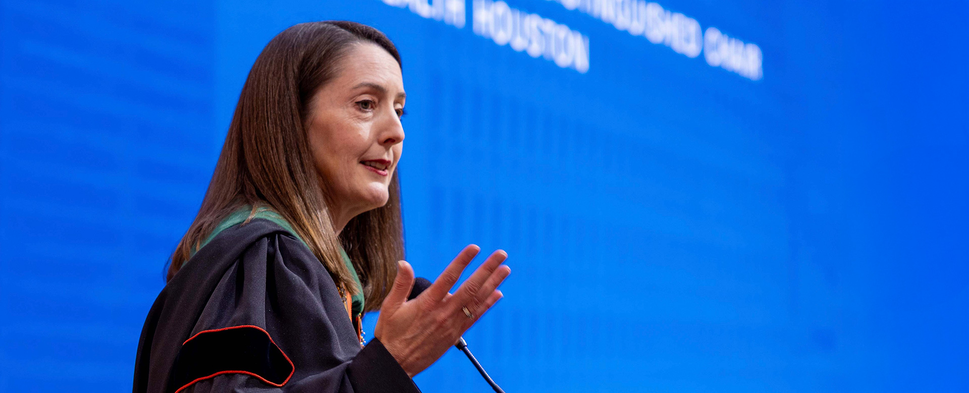 UTHealth Houston President Melina Kibbe speaks at a podium during a university event.