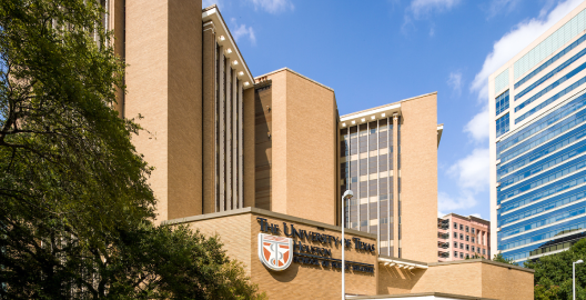 The UTHealth Houston School of Public Health building exterior on a sunny day.