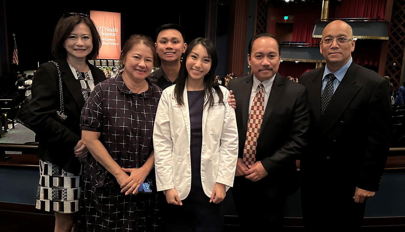Karina Samsuhadi is surrounded by family at her McGovern Medical School White Coat Ceremony. (Courtesy photo)