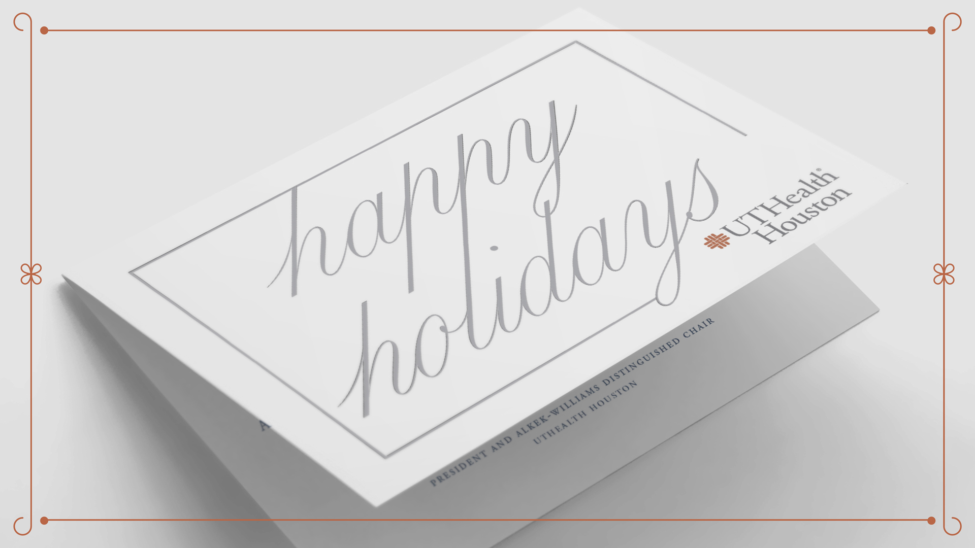 An envelope that reads Happy Holidays.