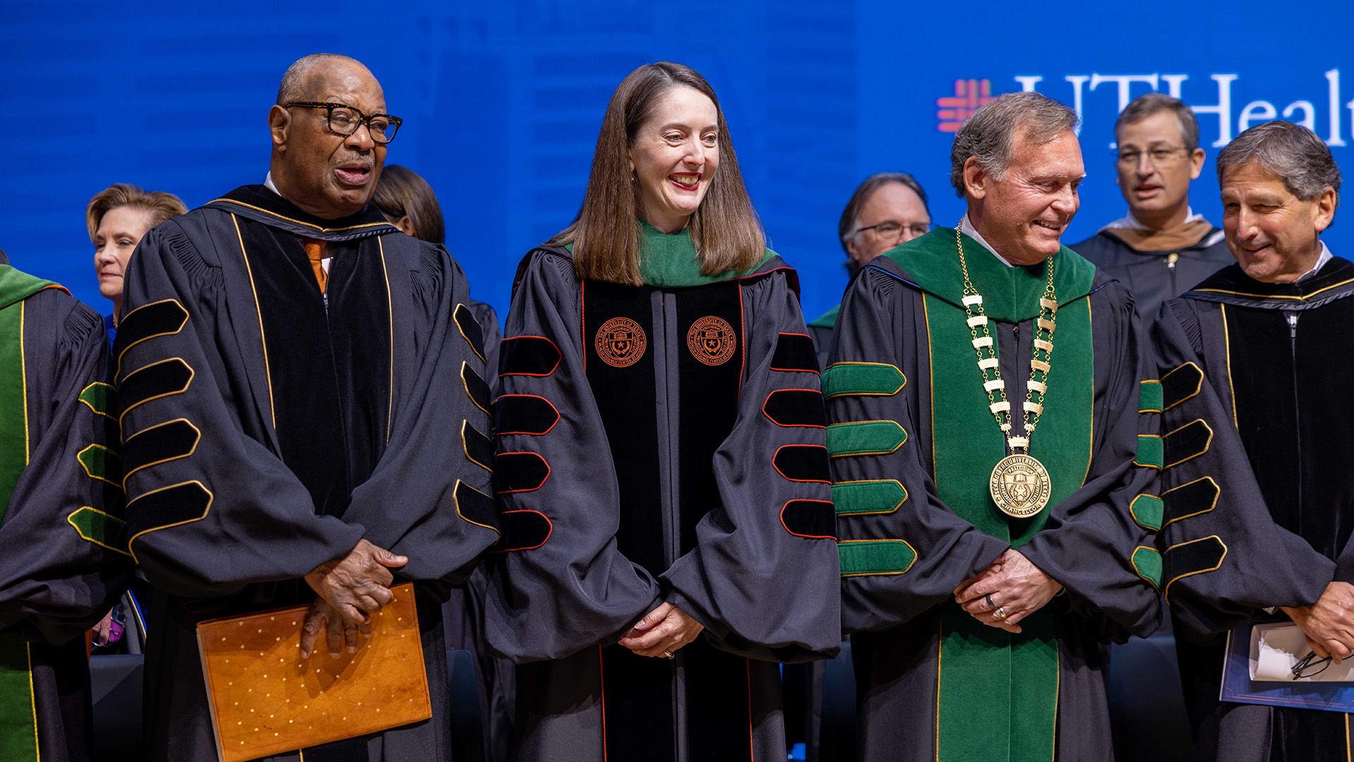 President Kibbe smiling looking down during her Investiture